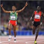Haile Gebrselassie, of Ethiopia, defeating Paul Tergat of Kenya in the 10000 m run at the Sydney 2000 Olympics